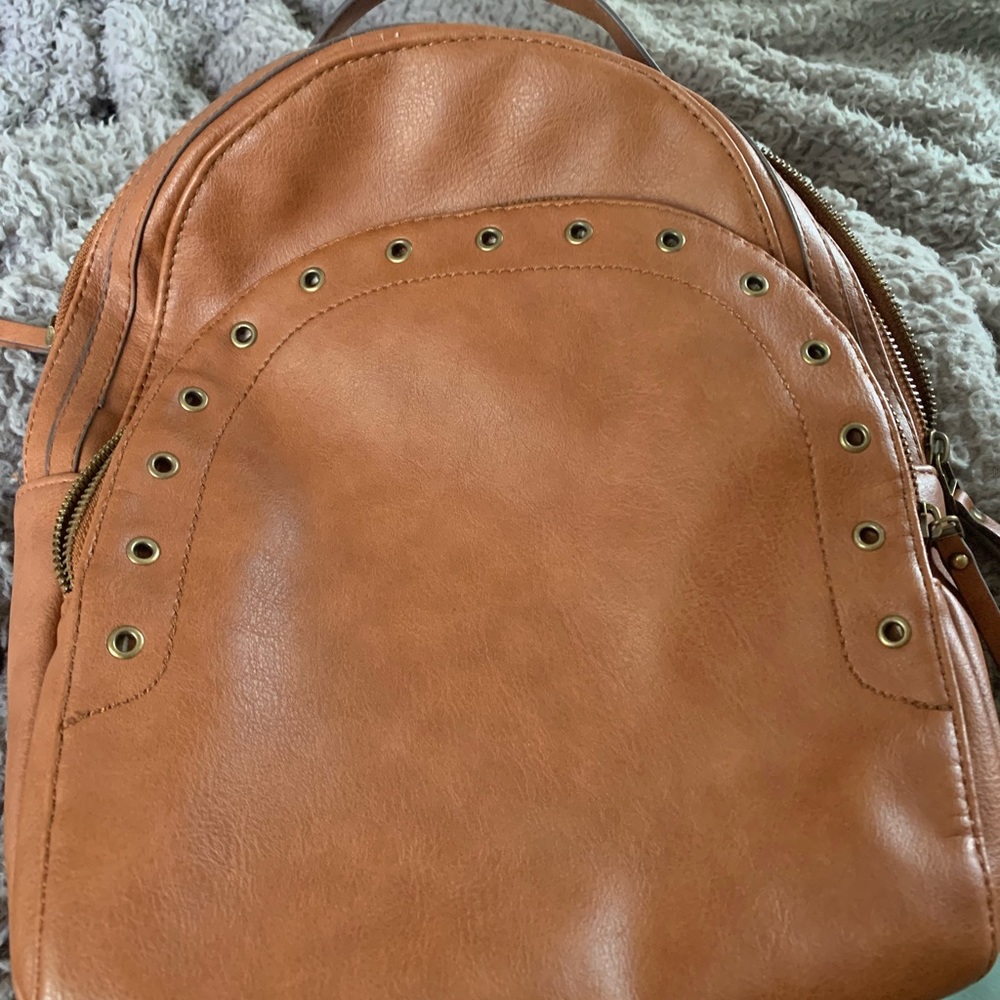 Maurices back pack and matching wallet used twice